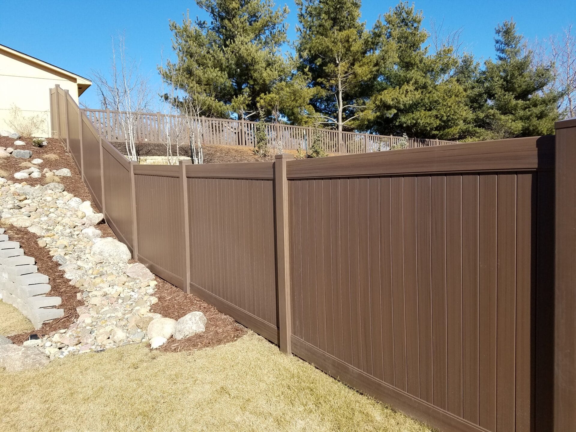 Why staining your fence or deck is the better way to go